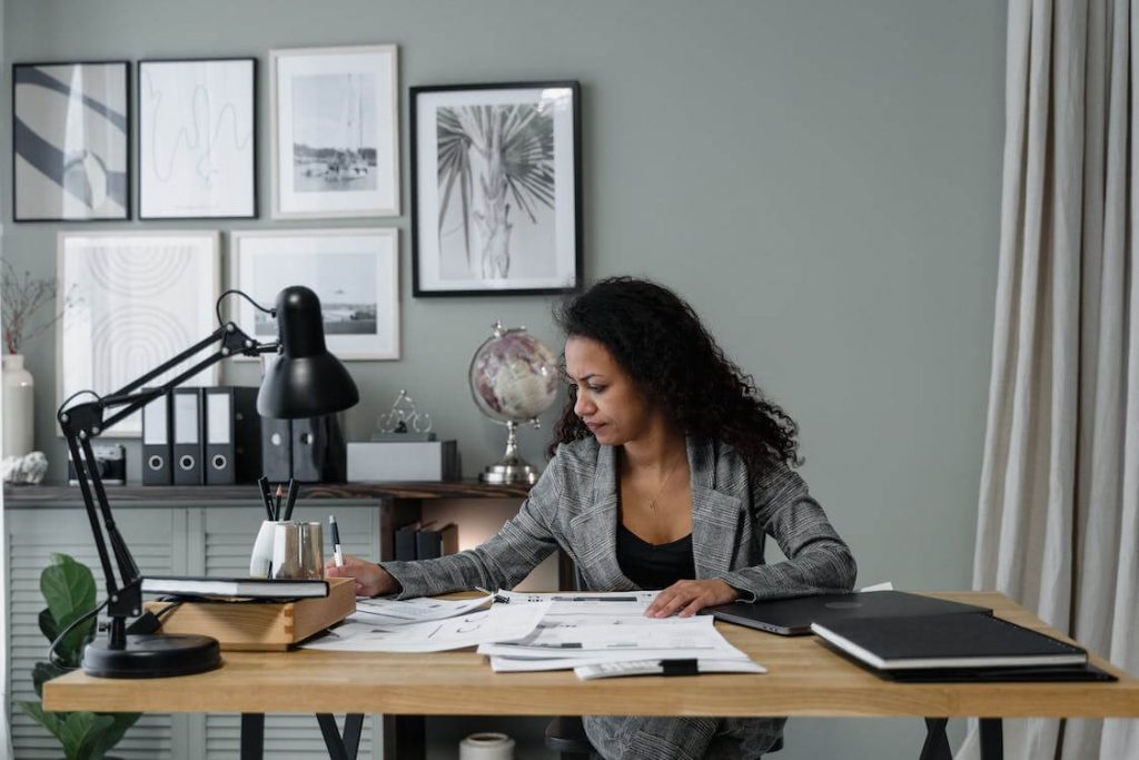 woman reviewing financial documents