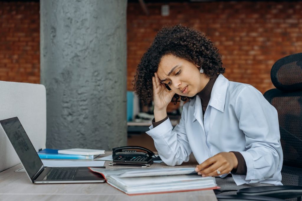 woman looking at her tax bill
